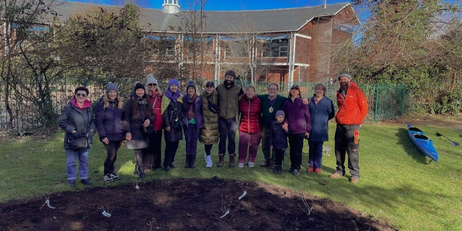 Volunteers Help Plant The Rose Beds At The Peace Gardens 2