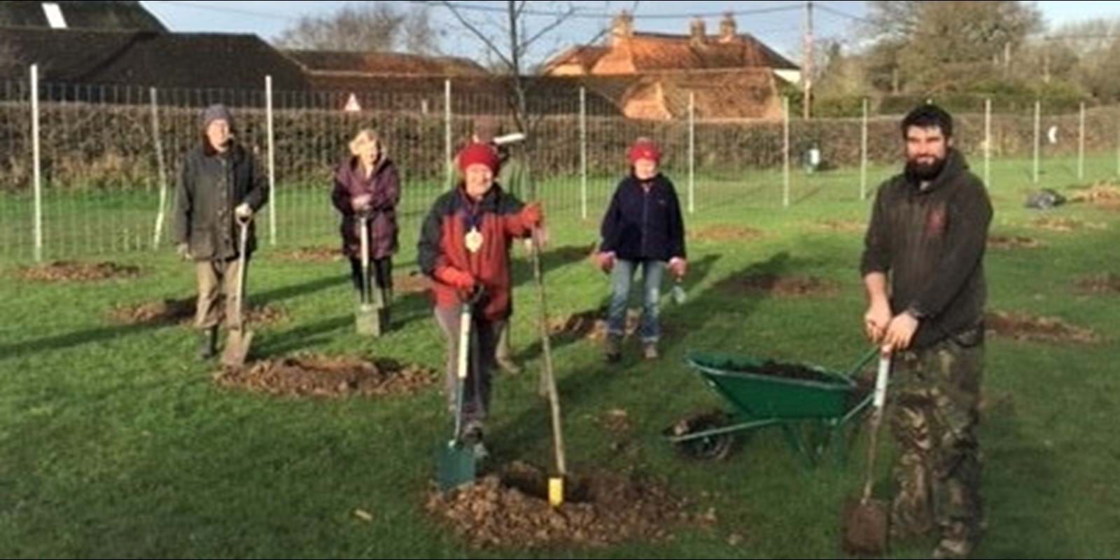 Community Tree Planting WC Blossoms Field