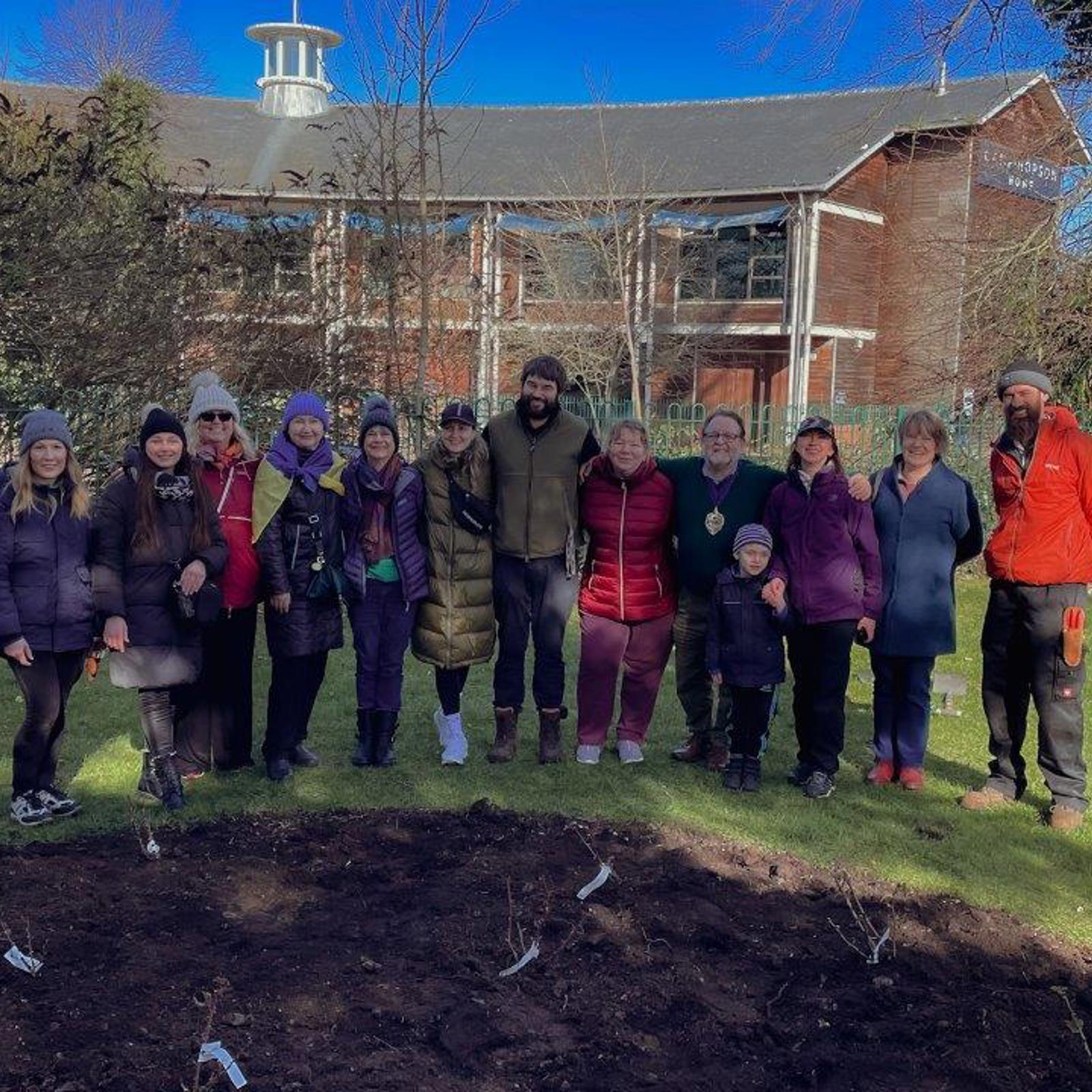 Volunteers Help Plant The Rose Beds At The Peace Gardens 2 (1)